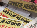 Charlie Hebdo опубликовал карикатуру на российских фанатов футбола Charlie Hebdo опубликовал карикатуру на российских фанатов футбола