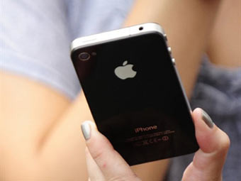 iPhone 4. ���� &copy;AFP