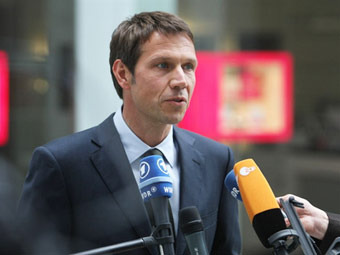  ,   "Deutsche Telekom".  ©AFP